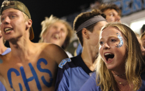  Several students cheering from the section.